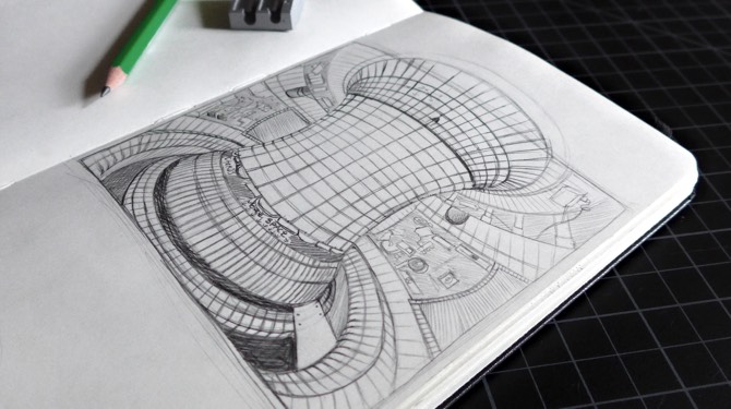 Photo of sketchbook displaying initial pencil sketch of a tokamak for WORK